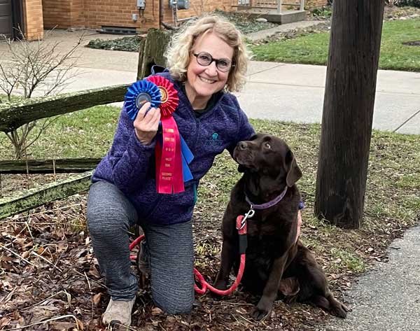 West Michigan Dog Show Board Member Susan Kohloff with her dog Dory